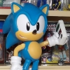 Sonic (by Jakks Pacific) holding a Mattel Electronics Football handheld (by Super Impulse). Also an unintentional Thomas Kalinske reference.