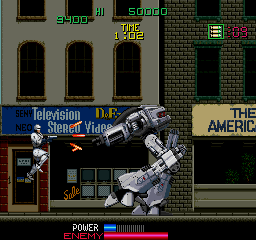 Officer Alex J. Murphy vs. ED-209 do battle in the streets of Old Detroit.